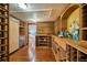Custom wine cellar with wooden racks and storage for an extensive collection at 802 Druid S Rd, Clearwater, FL 33756