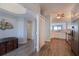 Stylish entryway showcases wood-look floors and access to the kitchen, creating a welcoming flow at 8020 Sailboat Key S Blvd # 404, St Pete Beach, FL 33707