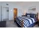 Comfortable bedroom leading to bath, offering convenience and a relaxing atmosphere at 8020 Sailboat Key S Blvd # 404, St Pete Beach, FL 33707