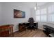 Functional office space with a comfortable chair, built in storage and a window with natural light at 8020 Sailboat Key S Blvd # 404, St Pete Beach, FL 33707