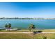 Scenic water view from the property, capturing the serene waterfront with calm blue water and cityscape at 8020 Sailboat Key S Blvd # 404, St Pete Beach, FL 33707
