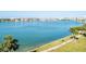 Expansive water view showcasing the waterfront property and beautiful blue water on a bright day at 8020 Sailboat Key S Blvd # 404, St Pete Beach, FL 33707
