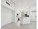 Modern kitchen featuring stainless steel appliances and white cabinets at 9008 Lake Chase Island Way, Tampa, FL 33626