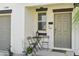 Charming front door entrance with stylish decor and a well-kept exterior at 11944 Miracle Mile Dr, Riverview, FL 33578