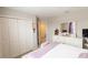 Comfortable bedroom with a triple wardrobe and an ensuite for convenience and ample storage at 12294 Cypress Branch St, Riverview, FL 33579
