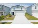 Inviting two-story home featuring a two-car garage, landscaped front yard, and a welcoming entrance at 12294 Cypress Branch St, Riverview, FL 33579