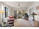 Inviting living room with balcony views, built-in shelving, and comfortable furniture at 130 4Th N Ave # 315, St Petersburg, FL 33701