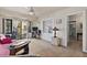 Cozy living room with balcony access and view to a bathroom at 130 4Th N Ave # 315, St Petersburg, FL 33701