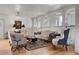 Bright living room featuring hardwood floors and a decorative chandelier at 130 4Th N Ave # 315, St Petersburg, FL 33701