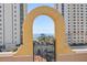 Arched terrace gate frames stunning ocean views and cityscape at 130 4Th N Ave # 315, St Petersburg, FL 33701
