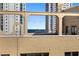 Balcony view overlooking the harbor with string lights adding a touch of ambiance to the building's exterior at 130 4Th N Ave # 315, St Petersburg, FL 33701