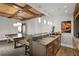 Chic bar area complete with granite counters, pendant lighting, bar seating, and game table access at 146 4Th Ne Ave # 600, St Petersburg, FL 33701