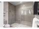 Modern bathroom featuring a glass-enclosed shower with gray tiling and sleek fixtures at 146 4Th Ne Ave # 600, St Petersburg, FL 33701