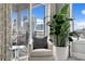 Inviting bedroom with a chair facing a window and city views at 146 4Th Ne Ave # 600, St Petersburg, FL 33701