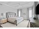 Elegant bedroom with tray ceiling, luxurious linens, and decorative lighting features at 146 4Th Ne Ave # 600, St Petersburg, FL 33701
