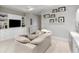 Comfortable living room featuring built-in shelves, TV, and a plush sofa at 146 4Th Ne Ave # 600, St Petersburg, FL 33701