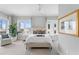 Serene main bedroom boasts abundant natural light, tasteful decor, and views of the city skyline at 146 4Th Ne Ave # 600, St Petersburg, FL 33701