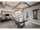 Recreation room with bar, table tennis, lounge area, and a coffered ceiling at 146 4Th Ne Ave # 600, St Petersburg, FL 33701