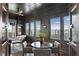 Sitting area featuring dark wood paneling, natural light, and views of the city at 146 4Th Ne Ave # 600, St Petersburg, FL 33701