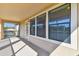 Spacious covered balcony with views, perfect for relaxing and enjoying the outdoors at 19432 Whispering Brook Dr, Tampa, FL 33647