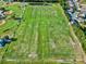 Aerial view of soccer fields and baseball fields surrounded by trees and a residential area at 22647 Eagles Watch Dr, Land O Lakes, FL 34639