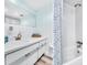 Fresh bathroom featuring a white vanity, framed mirror, and shower-tub combination at 2348 Shelley St # 8, Clearwater, FL 33765