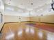 Indoor basketball court with hardwood floor and plenty of space for recreational activities at 2400 Feather Sound Dr # 1118, Clearwater, FL 33762