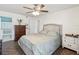 Cozy bedroom with a plush bed, stylish furniture, and neutral color scheme at 2400 Feather Sound Dr # 1118, Clearwater, FL 33762