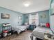 Bright bedroom featuring two twin beds, stylish decor, and lots of natural light at 2400 Feather Sound Dr # 1118, Clearwater, FL 33762