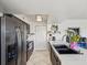 Bright kitchen featuring stainless steel appliances and an island at 2400 Feather Sound Dr # 1118, Clearwater, FL 33762