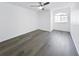 Bright, airy bedroom with wood floors, a large window and great natural light at 2523 Northfield Ln, Clearwater, FL 33761