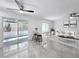 Stylish living area showcasing sleek tile flooring, modern fixtures, and an open layout at 2523 Northfield Ln, Clearwater, FL 33761