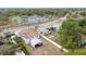 An aerial perspective shows the property's location, near local tennis courts and a variety of neighborhood amenities at 2610 E Yukon St, Tampa, FL 33604