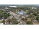 Aerial view featuring neighborhood tennis courts, park and water at 2610 E Yukon St, Tampa, FL 33604