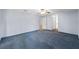 Large bedroom with ceiling fan, ample closet space, and natural light at 26290 Hayman Rd, Brooksville, FL 34602
