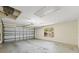 Spacious two-car garage with an automatic door opener and window at 26290 Hayman Rd, Brooksville, FL 34602