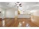 Spacious living room featuring wood floors, natural light, and an open concept layout at 26290 Hayman Rd, Brooksville, FL 34602