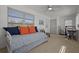 Bright bonus room with a daybed, work space, and natural light from many windows at 3457 Cyclone Dr, Weeki Wachee, FL 34607