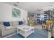 Coastal living space features stylish décor and convenient access to dining area and kitchen at 3457 Cyclone Dr, Weeki Wachee, FL 34607