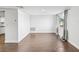 Bedroom featuring wood-look flooring and natural light from large windows at 3646 Springfield Dr, Holiday, FL 34691