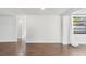 This living room has wood-look tile floors and lots of natural light at 3646 Springfield Dr, Holiday, FL 34691