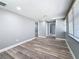 Spacious bedroom featuring hardwood flooring and natural light from the windows at 3755 10Th S Ave, St Petersburg, FL 33711