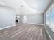 Spacious living room with modern finishes, vinyl plank flooring, and natural light at 3755 10Th S Ave, St Petersburg, FL 33711