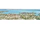 Expansive aerial view of a waterfront community with beautiful canals and stunning scenery at 3820 Gulf Blvd # 802, St Pete Beach, FL 33706