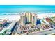 Aerial shot of a beachfront condo building with direct beach access and ample parking at 3820 Gulf Blvd # 802, St Pete Beach, FL 33706