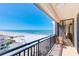 Relaxing balcony featuring breathtaking ocean views, comfortable seating, and direct access to the beach at 3820 Gulf Blvd # 802, St Pete Beach, FL 33706