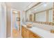 Bathroom featuring a unique bowl sink with tiled accents, a spacious vanity, and modern lighting at 3820 Gulf Blvd # 802, St Pete Beach, FL 33706