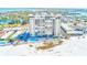 Expansive beachside high-rise featuring a pool with panoramic ocean views and beach access at 3820 Gulf Blvd # 802, St Pete Beach, FL 33706