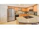 Updated kitchen with stainless steel appliances, modern countertops, and custom cabinetry at 3820 Gulf Blvd # 802, St Pete Beach, FL 33706