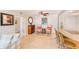 Living area with tiled floors, bamboo accents, and comfortable seating at 3820 Gulf Blvd # 802, St Pete Beach, FL 33706